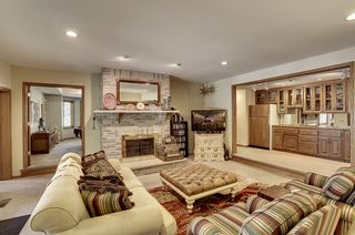 The Family Room includes a brick fireplace and wet bar!