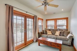 Sunroom/Family room leads to the upper deck for another outdoor getaway