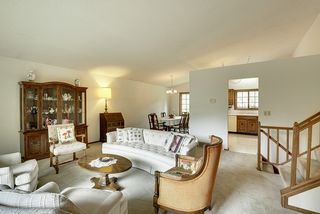 View from living room into dining room and kitchen - easily open up the space further by removing the kitchen wall and adding an island!