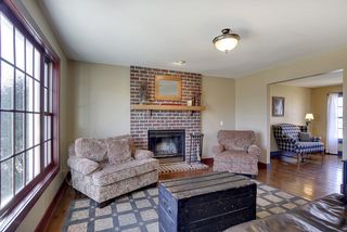 Living room on main floor off of kitchen and Family room