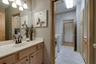 Main level half bath opens to laundry...