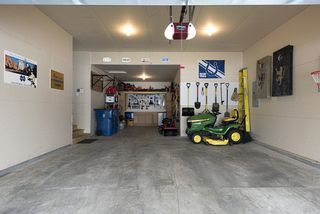 3-car tandem style garage. built-in work bench and cabinets in far end. Fully insulated.