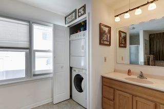 Main level bath combines space with laundry for use of space