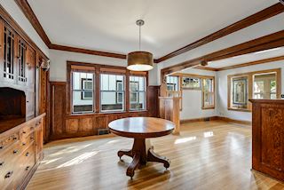 Dining room with living room to right side