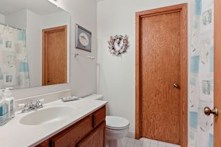 Master walk-through full bath with closet access.