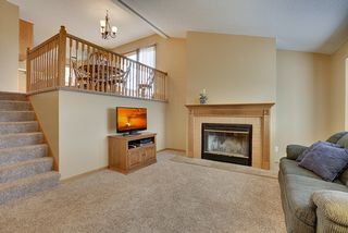 1500 4th St NE - Dining overlooking living room - open - bright - sun-filled rooms