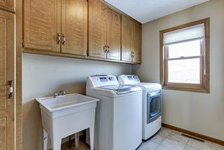 MF laundry with additional storage and window to back yard