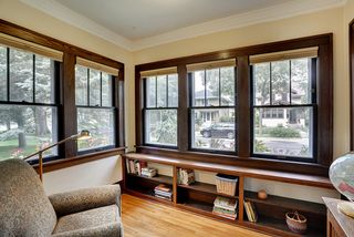 Sunroom/office features up-down blinds, also found throughout the main floor