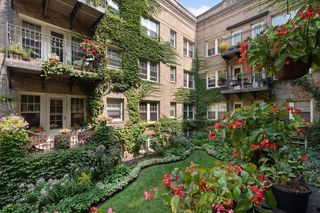 View looking east toward the front courtyard and the units' decks