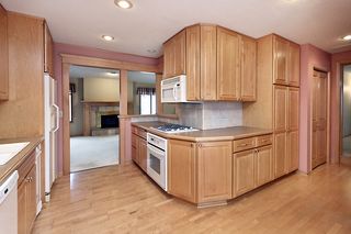 Kitchen opens to living room and office