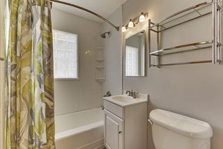 The Updated Bathroom features a Glass Block Window for added Light & Privacy...