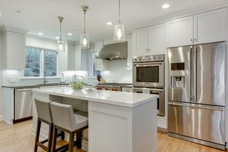 Stainless steel appliances including a Thermador double oven