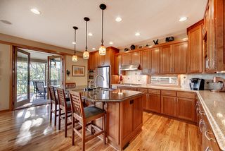 Stainless steel appliances, large center island with cambria counter surfaces.