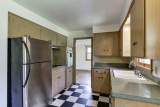 Stainless refrigerator, cook-top with fan/hood, and built-in oven...