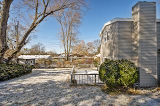 Private backyard with storage shed!