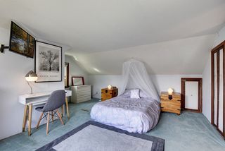 Upper level bedroom has 2 closets and added storage