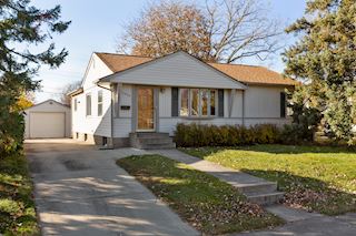 Welcome home to this move-in ready Highland Park house!