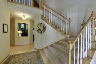 Grand wide staircase takes you to the 4 bedrooms on the upper level