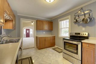 Pot rack, range and service counter for dining room entertaining. 