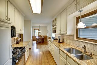 Spacious kitchen expanding into dining room.