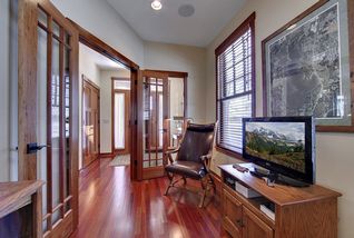 Brazillian cherry flooring with cherry millwork throughout.