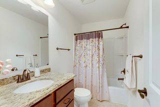 The shared full bathroom upstairs - granite counters and oil-rubbed bronze fixtures.