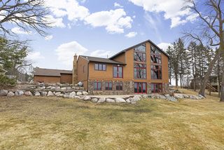 Boulder terraced hillside - professionally landscaped  frame the lodge - like setting.