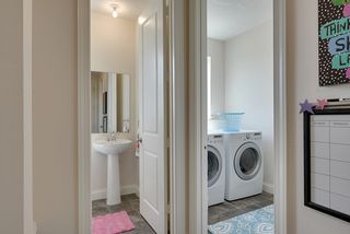 Powder room and laundry conveniently located off the kitchen - 3942 Campello Curve