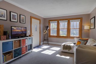 Sunshine spills into the living room. 