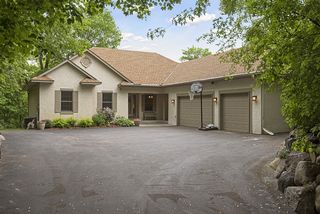 Set on a .74 acre lot surrounded by wonderful mature trees makes this property feel very private