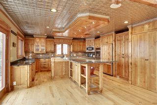 The kitchen is a culinary dream with big work area's, large built - in pantry spaces and lots of storage.