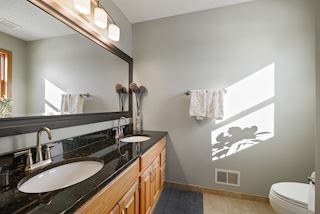 Master bath with granite counter top and dual sinks
