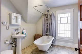 Upper gull bathroom with clawfoot soaker tub!