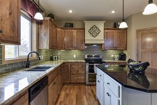 Stainless Steel appliances, kitchen window overlooks the back yard