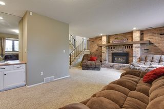 This family room will welcome you summer and winter...