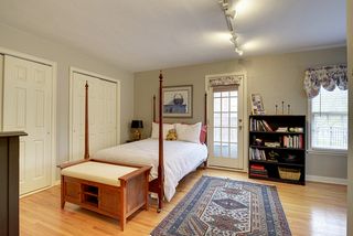 Bedroom #2 features Hardwood Floors, Double Closets and a Private Rooftop Balcony! 