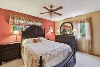 13.5 x 12 Main floor master bedroom features his and her closets