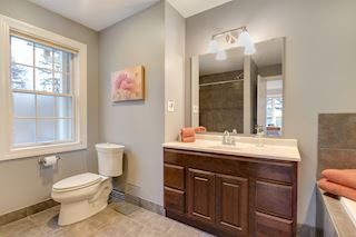 Master Bath has a separate walk in shower and jetted tub