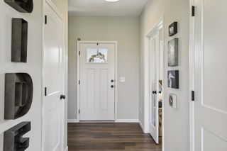 Love the handsomely dark flooring in contrast with 
the clean, white and grayish interior specifications.