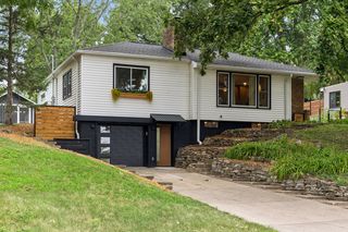 Welcome to 3037 Kyle Ave N - a 1950s mid-century rambler with plenty of updates and surprises you're sure to love
