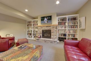 Adjacent to the fireplace are the built-in bookshelves.