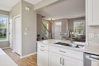 New Quartz counters and SS sink with drying rack and strainer.