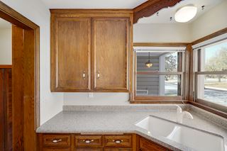 Nice corner sink with double Marvin windows!