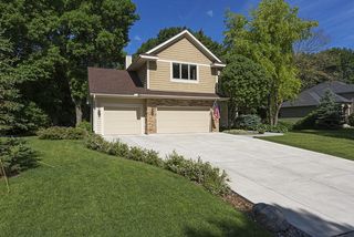 Large 3 car garage and deep driveway