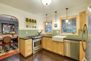 The Custom Designed Kitchen is amazing! Top-of-the-Line Backsplash Tile, Stainless Steel Appliances, Pendant Lighting & Marvin Windows! 