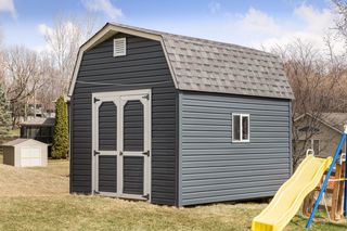 Close up of Shed - Seller is leaving play set.