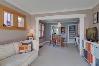 Natural and enameled trim highlights ceilings, windows and cased openings. 