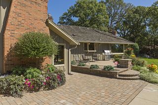 Beautiful paver patio offers privacy and relaxation