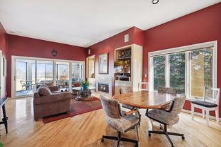 Dinette and family room flow together with 3 season porch and deck accessible from the family room.