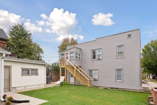 West facing view of 4 plex features all new Vinyl and Wood Siding, new Vinyl Window Wrap. New Vinyl Windows 2023 throughout. New Exterior Staircase that leads to apt #4 also has new Vinyl Windows. New Storm Doors on 3 entrances.